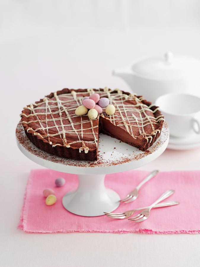 An Easter-themed Chocolate Cake On A Cake Stand Photograph by Gareth Morgans