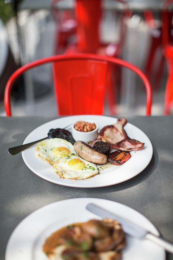An English Breakfast Served In A Restaurant Photograph by Helen Cathcart