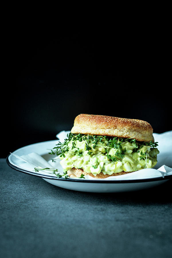 An English Muffin With Avocado-and-egg Salad And Cress Photograph by Simone Neufing