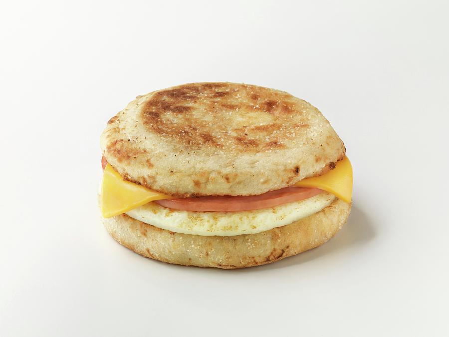 An English Muffin With Sausage And Cheese Photograph by Jim Scherer