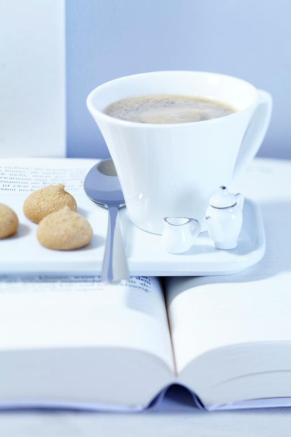An Espresso Cup And Amarettini With Dolls Crockery Photograph by Taube, Franziska