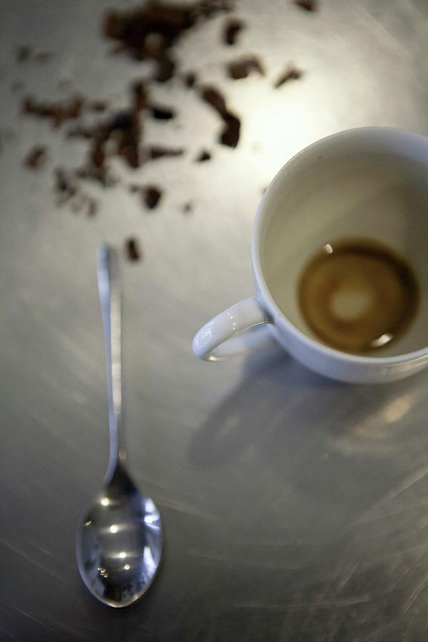 An Espresso Cup With The Remains Of A Cup Of Coffee Photograph by Cajo, Viola