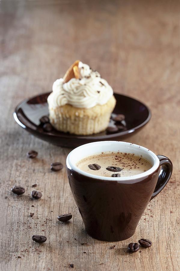 An Espresso With An Almond Cupcake Photograph by Twellmann, Birgit