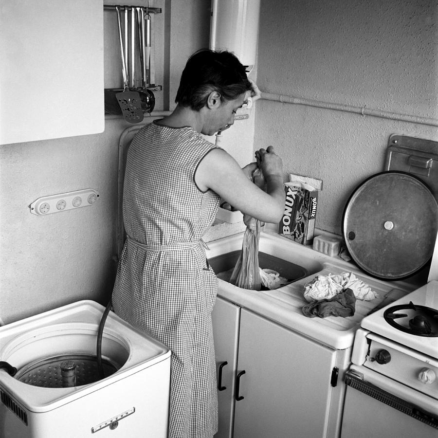 An Housewife Makes The Washing In Photograph by Charles Ciccione