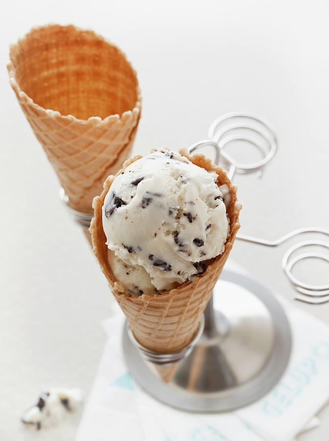An Ice Cream Cone Filled With Almond And Stracciatella Ice Cream Photograph by Lingwood, William