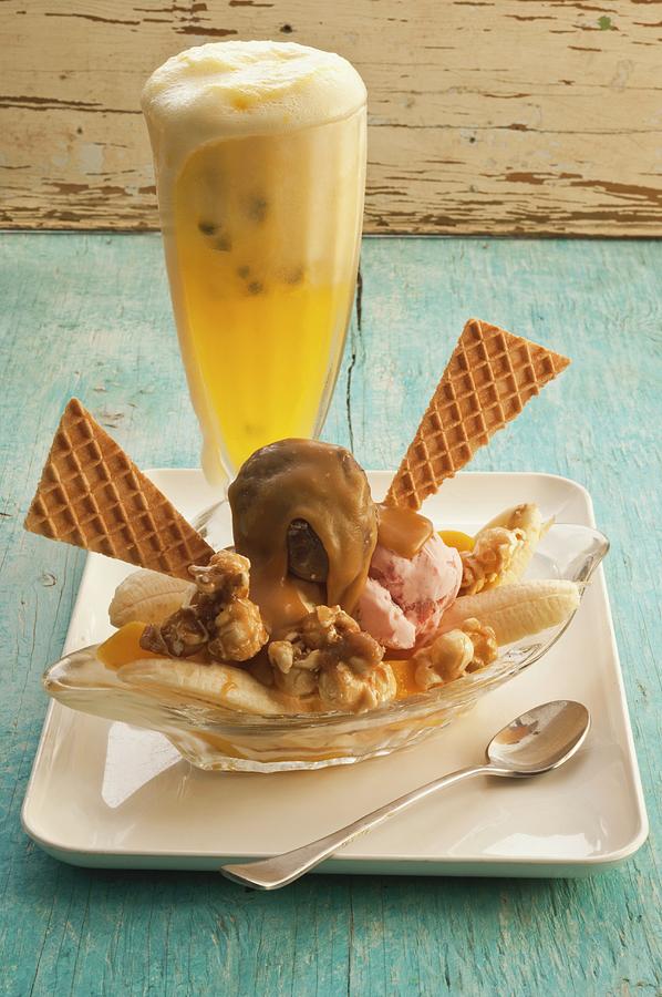 An Ice Cream Sundae And A Passion Fruit Drink Photograph by John Hay
