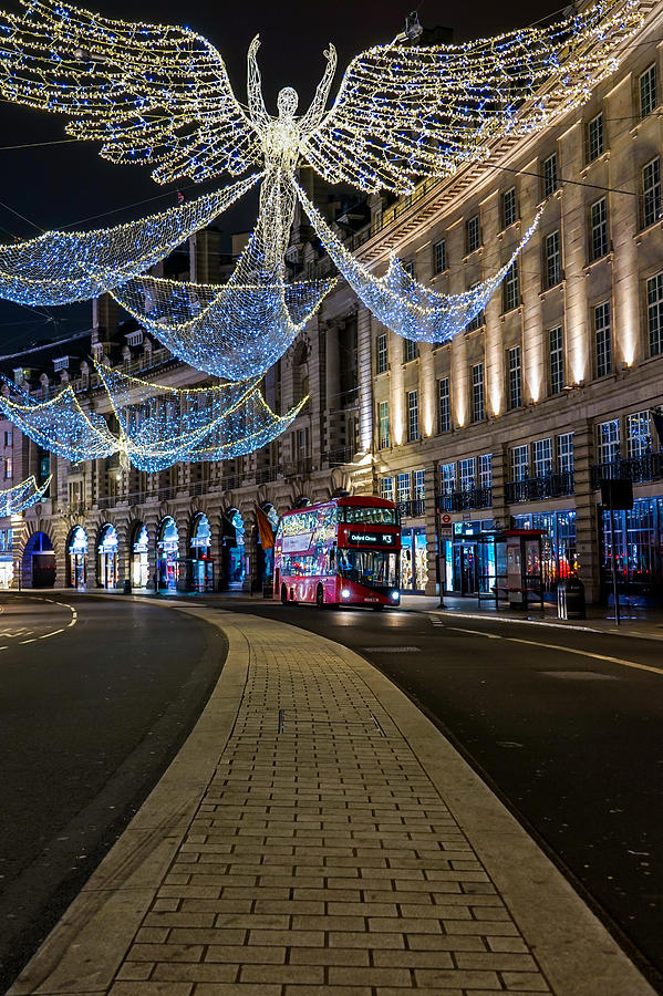 An Iconic Double Decker Red Bus In London, England, During Christmas At Oxford Circus. Photograph
