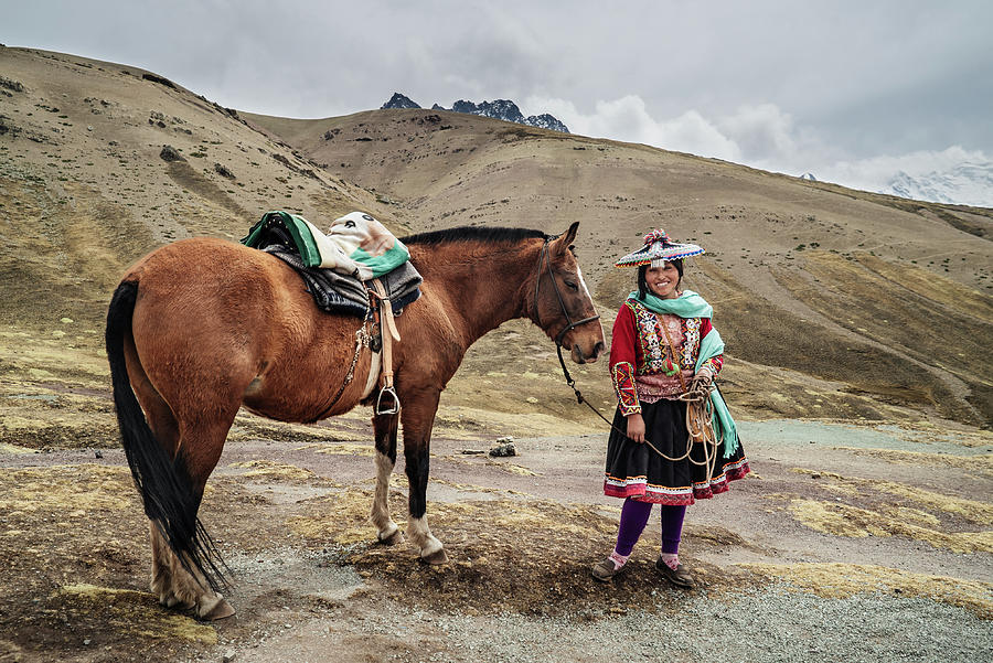 An indigenous Quechua woman with her horse in Peru Photograph by Kamran Ali