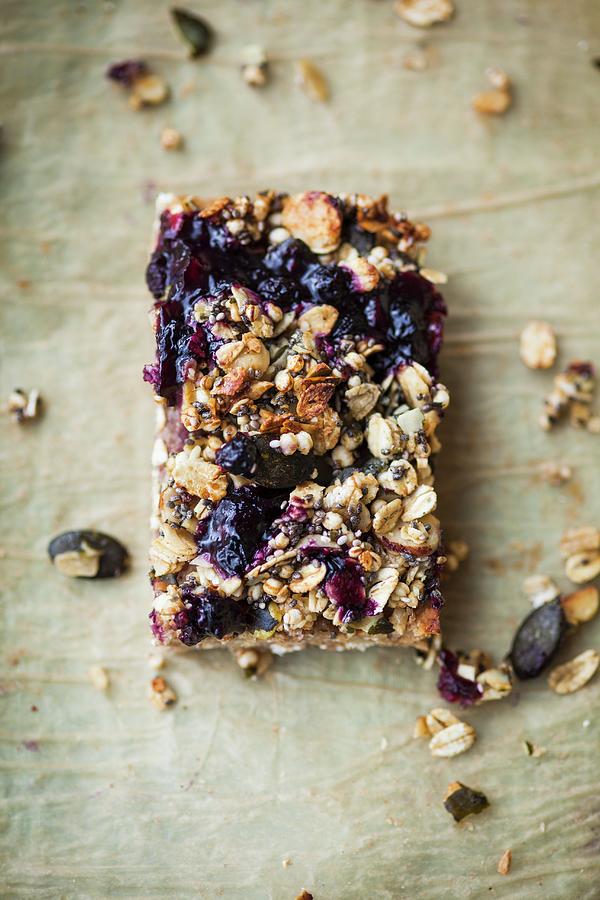 An Oatmeal Bar With Blueberries And Pumpkin Seeds superfood Photograph by Eising Studio