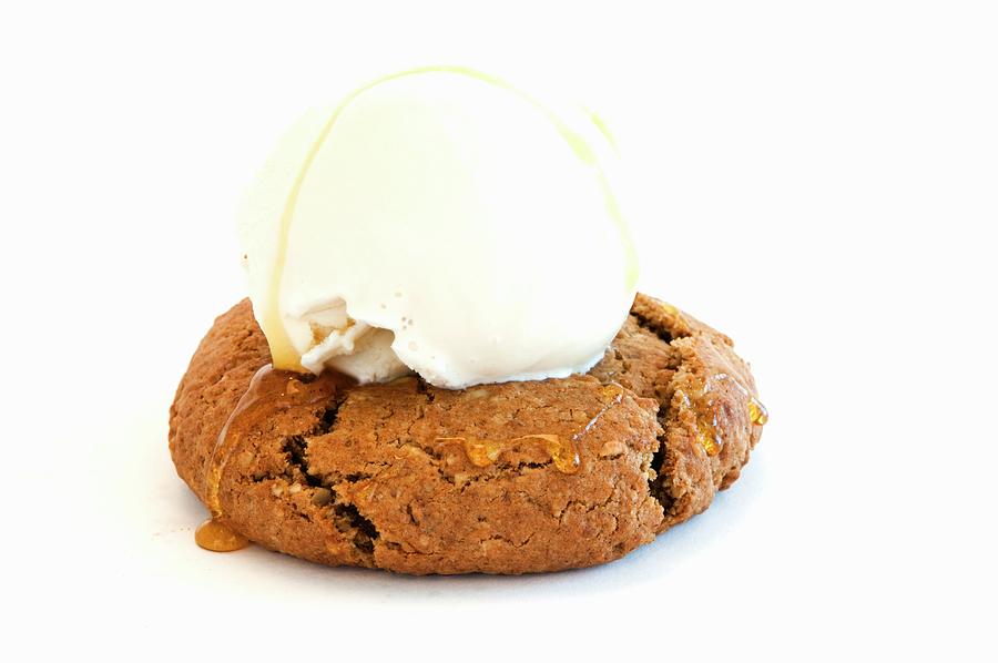 An Oatmeal Cookie Topped With A Scoop Of Vanilla Ice Cream And Drizzled With Honey Photograph by Rank, Erik