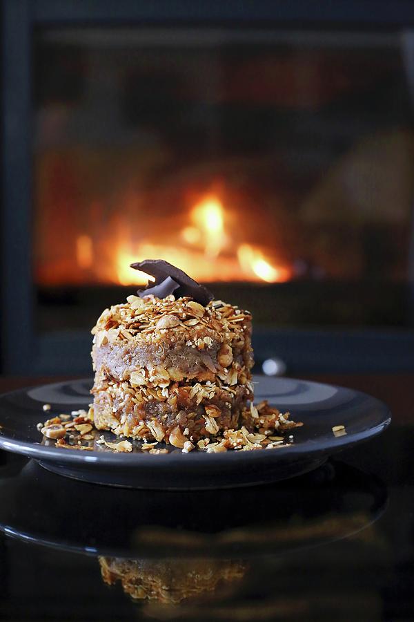 An Oats And Apple Dessert In Front Of An Open Fire Photograph by Natalia Mantur