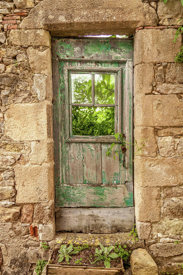 An old door in Penne France Photograph by W Chris Fooshee