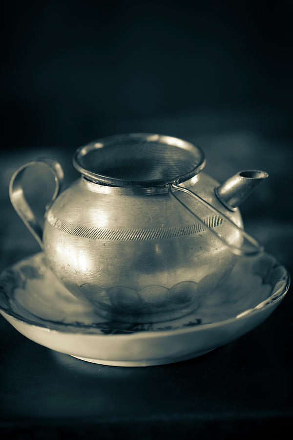An Old Teapot With A Tea Strainer Photograph by Eising Studio