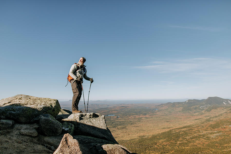 An Older Male Hiker Looks At The View From A Mountain In Maine ...