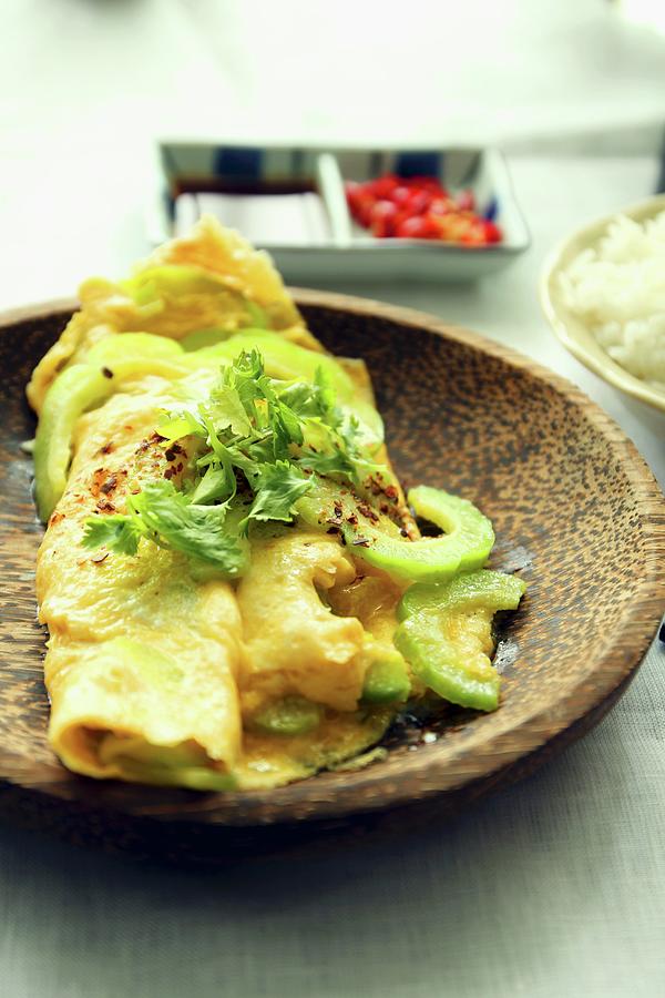 An Omelette With Bitter Melon And Coriander Photograph by Chopstickdiner