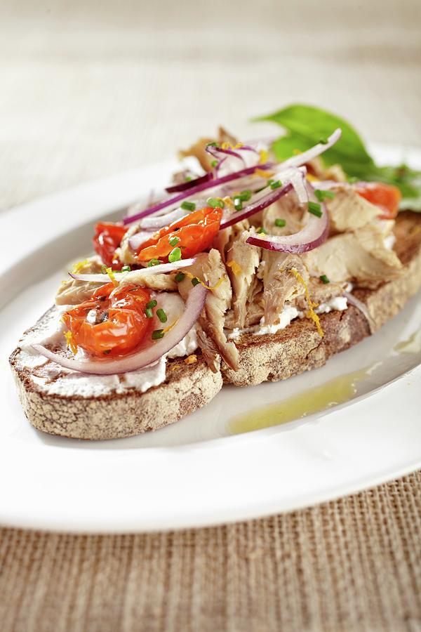 An Open Summer Sandwich With Tuna Fish, Tomatoes And Red Onions Photograph by Alessandra Pizzi