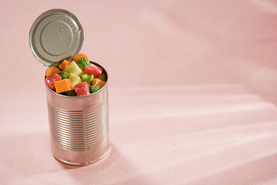 An Open Tin Can Filled With Raw, Diced Meat And Vegetables Photograph by Colin Cooke