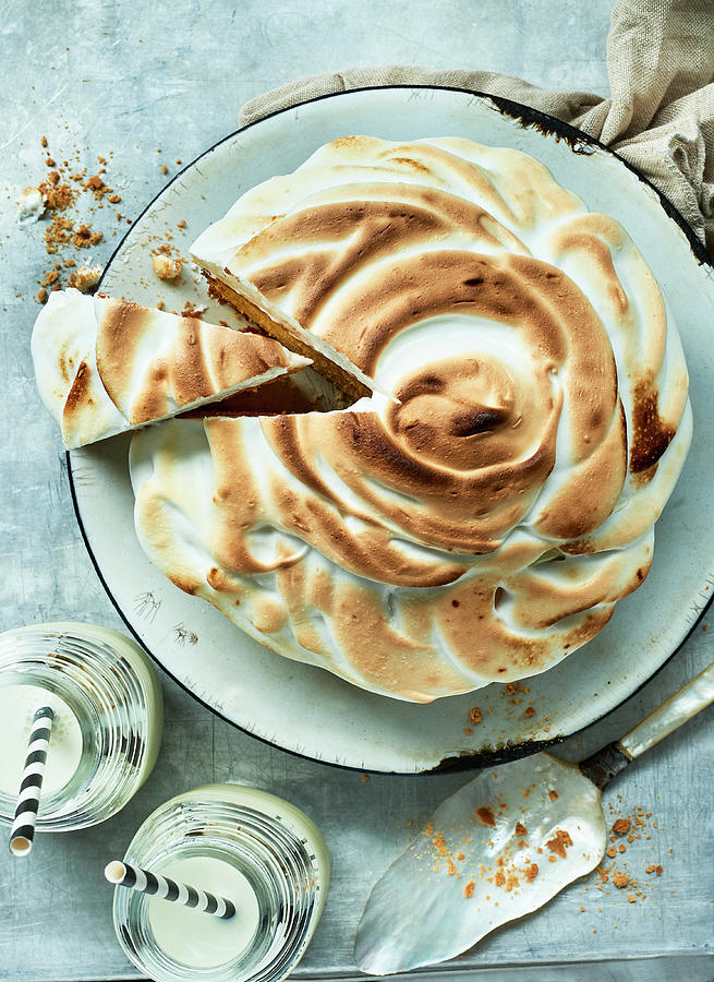 An Orange And Almond Cake With A Meringue Topping Photograph by Stefan Schulte-ladbeck
