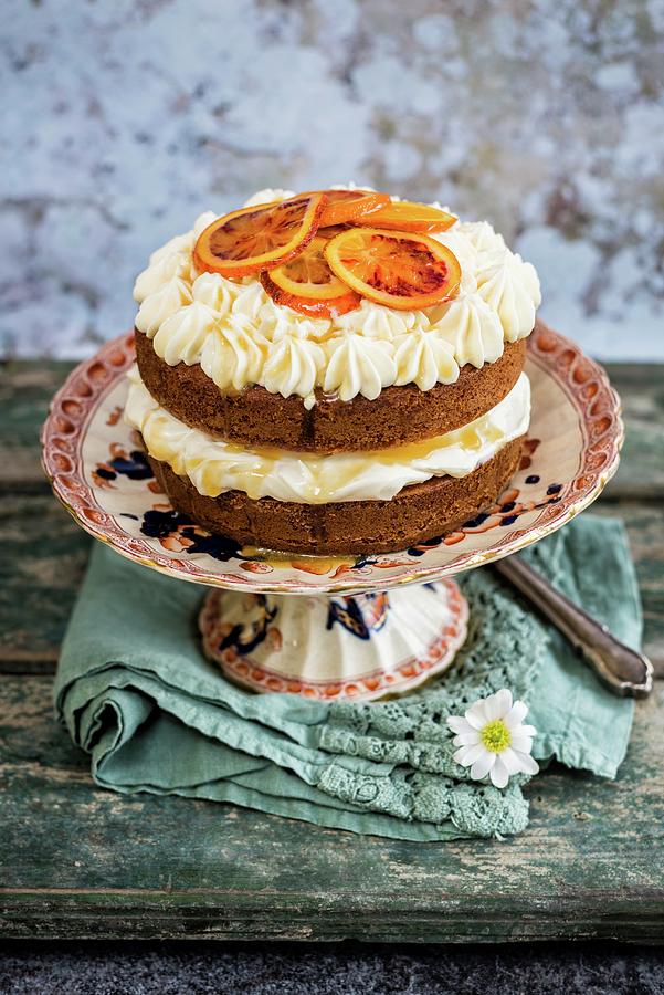 An Orange Pound Cake With Cream Cheese And Manuka Honey Photograph by Lucy Parissi