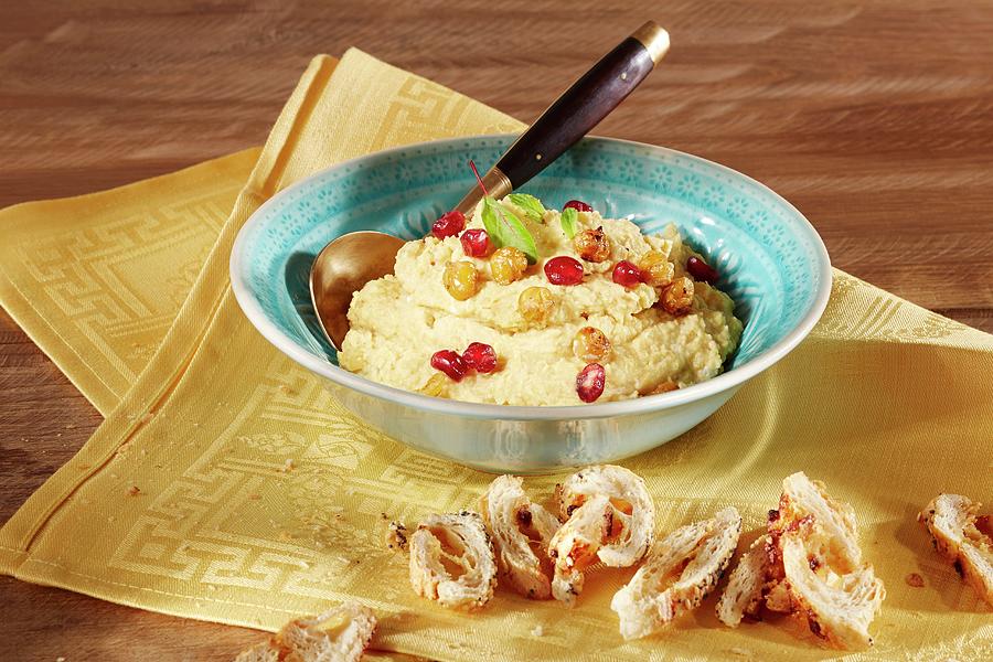 An Oriental Chickpea Dip With Pomegranate Seeds Photograph by Niklas Thiemann