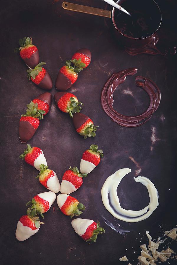 An Xoxo Greeting Made Of Strawberries Dipped In Chocolate And Melted Chocolate Photograph by Eising Studio