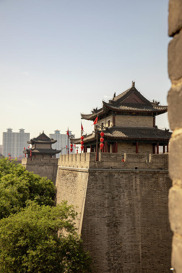 Ancient City Wall With Pagodas Against Modern Xian, China Photograph