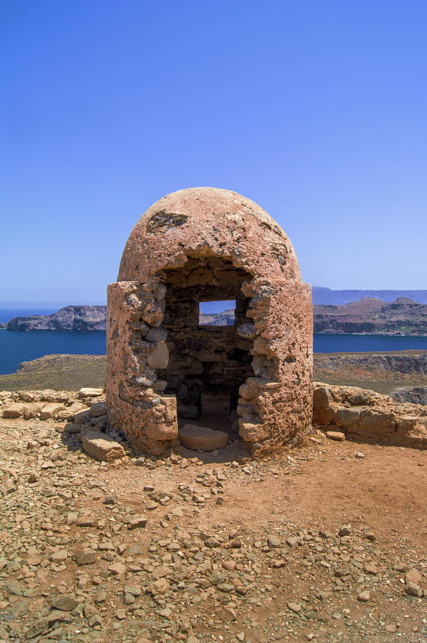 Ancient gun turret on Imeri Gramvousa Photograph by Sun Travels