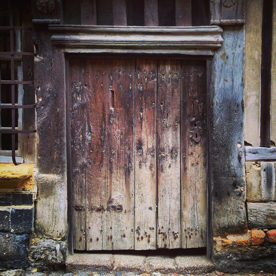 Ancient weathered wooden doorway Photograph by Seeables Visual Arts