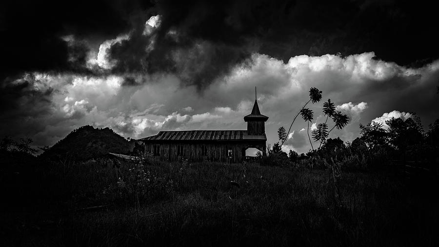 Ancient Wooden Church With Storm Clouds Photograph by Chris Lord