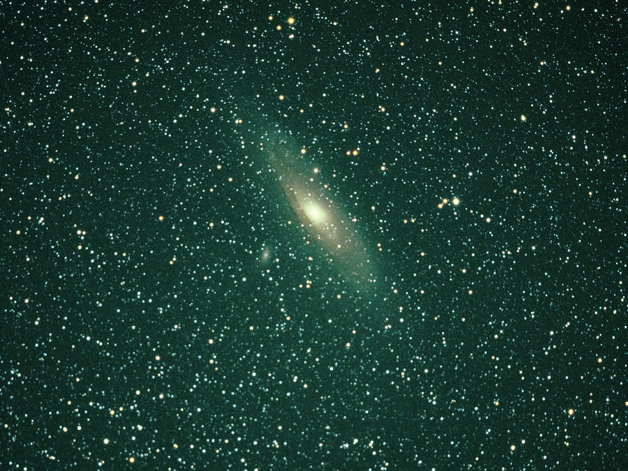 Andromeda Galaxy Photograph by Tpuerzer