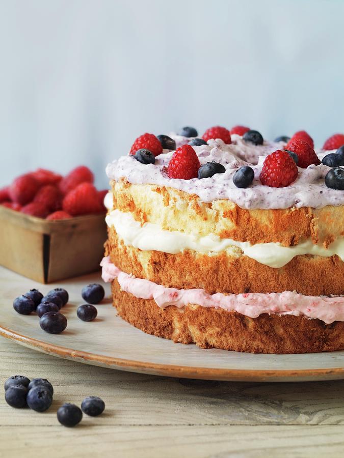 Angel Cake With Fresh Berries Photograph by Jim Scherer