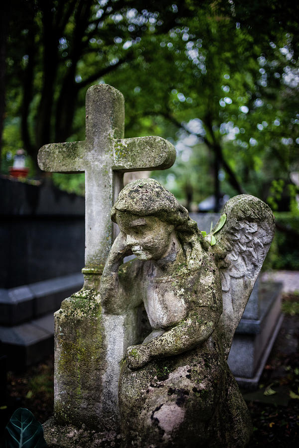 Angel Child and Cross in Old Cemetery Photograph by Artur Bogacki