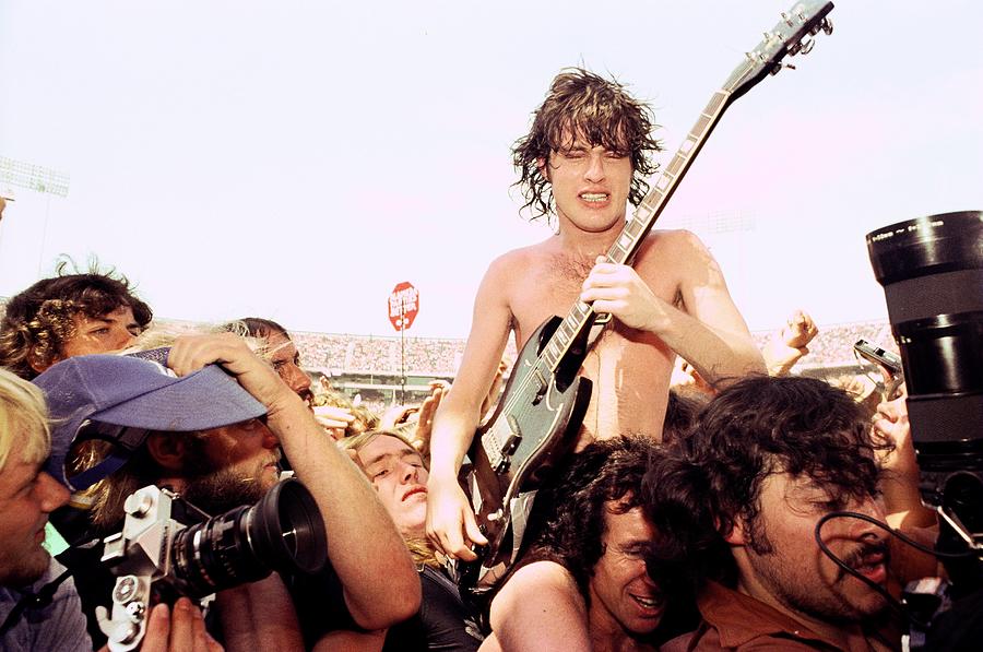 Angus Young And Bon Scott Of Acdc Photograph by Richard Mccaffrey