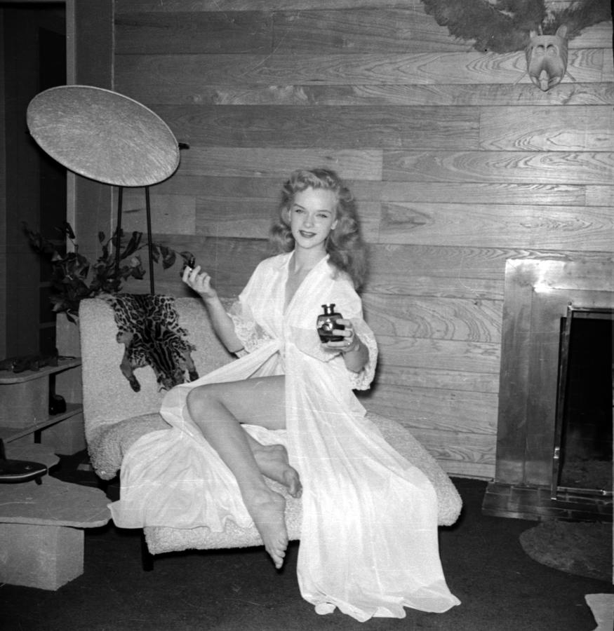 Anne Francis Sitting On Lounger by Frank Worth