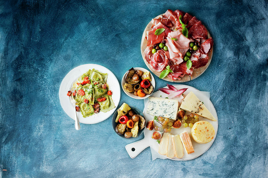 Antipasti: Cold Cuts, Cheese, Marinated Vegetables And Ravioli Photograph by William Reavell