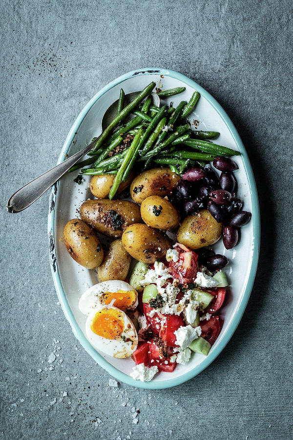 Antipasti Platter With Beans, Potatoes, Olives, Egg And Greek Salad Photograph by Simone Neufing