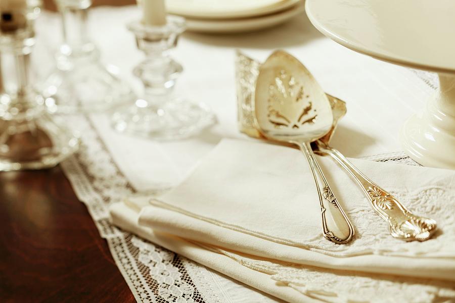 Antique Cake Serving Knives On Linen Napkins Photograph by Katharine Pollak