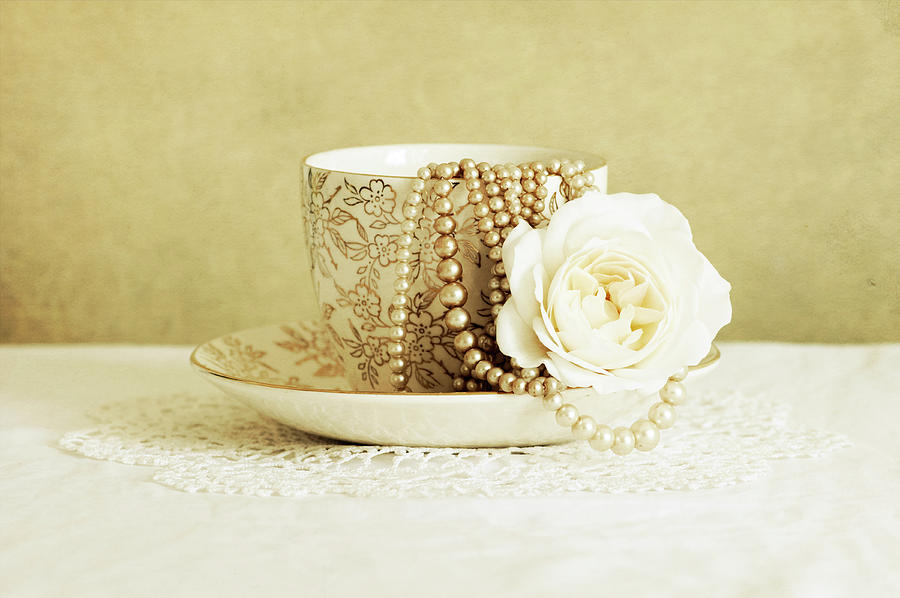 Still Life Photograph - Antique Cup And Saucer With White Flower And Pearls by Tom Quartermaine
