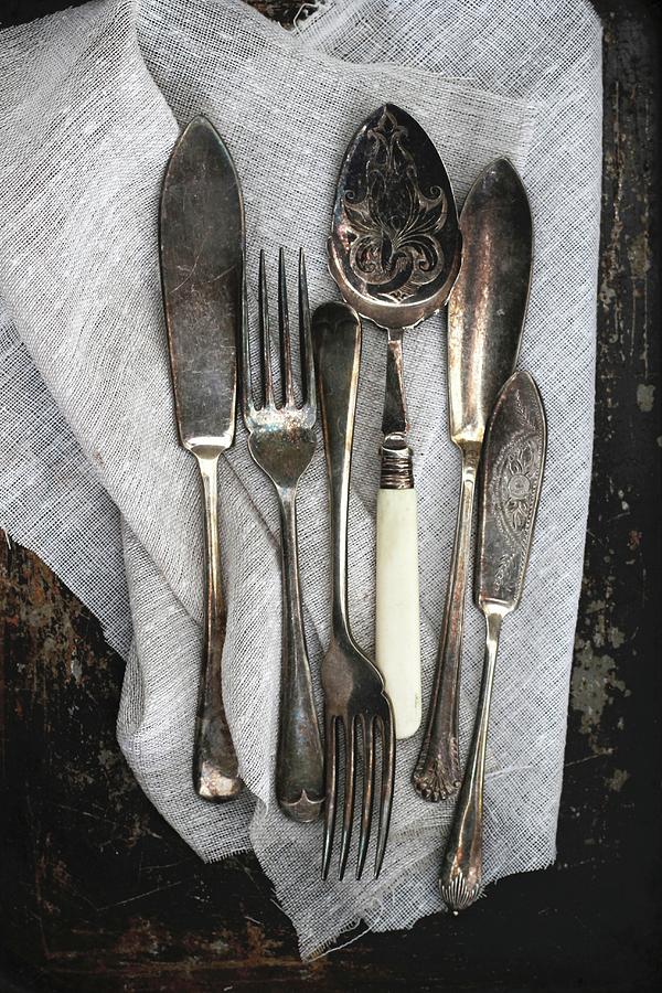 Antique Cutlery On A Linen Cloth Photograph by Ev Thomas