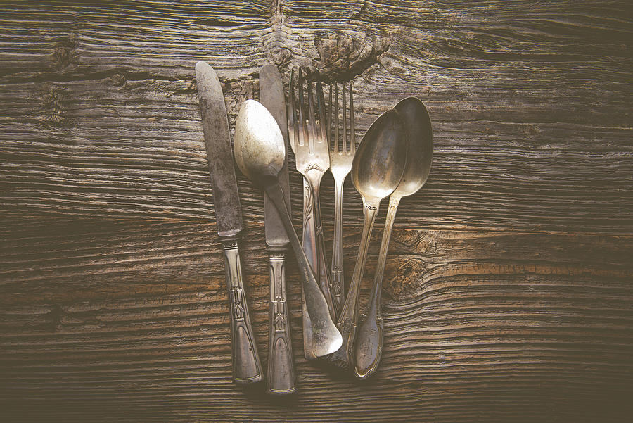 Antique Cutlery On A Wooden Table Photograph by Bruggey Visuelles