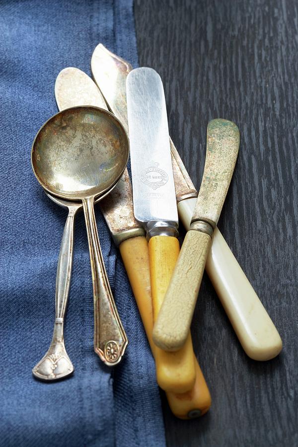 Antique Cutlery Photograph by Tim Pike