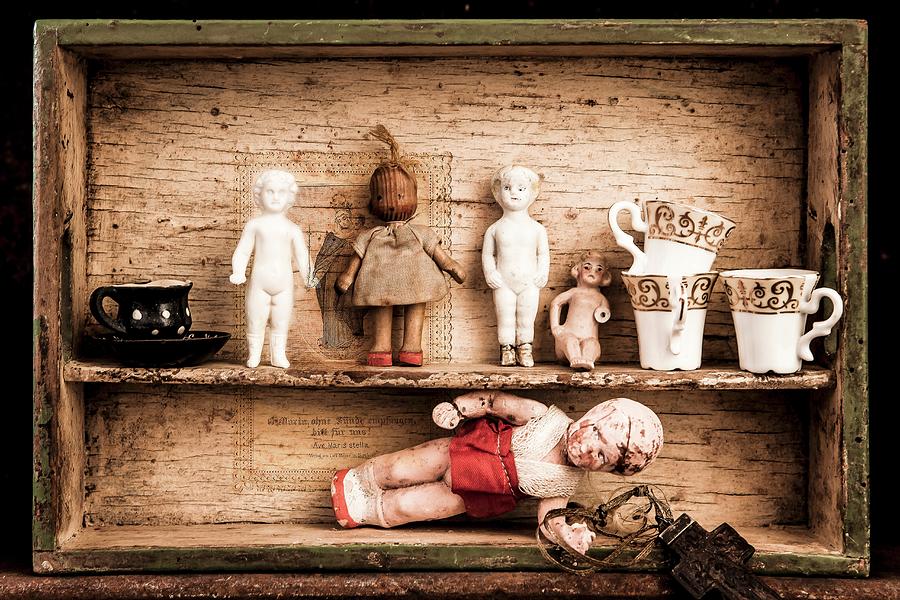 Antique Dolls And Crockery On Wooden Crate Photograph by Elisabeth Von Plnitz-eisfeld