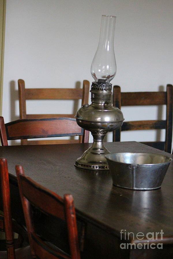 Antique Hurricane Lamp on Table Photograph by Colleen Cornelius