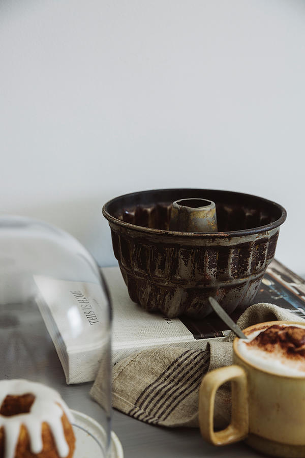 Antique Ring Cake Pan, Cappuccino And Mini Cakes Photograph by Daisy Hutter