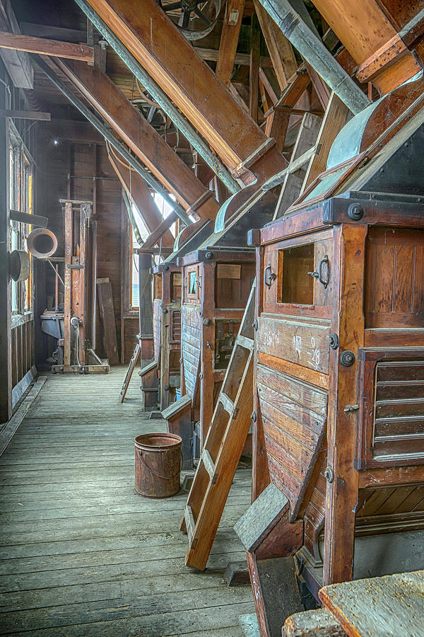 Antique wooden grist mill equipment Photograph by Karen Foley