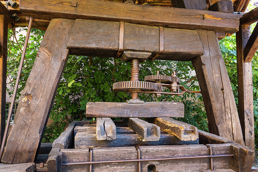 Antique wooden wine press in Alsace - France Photograph by Paul MAURICE