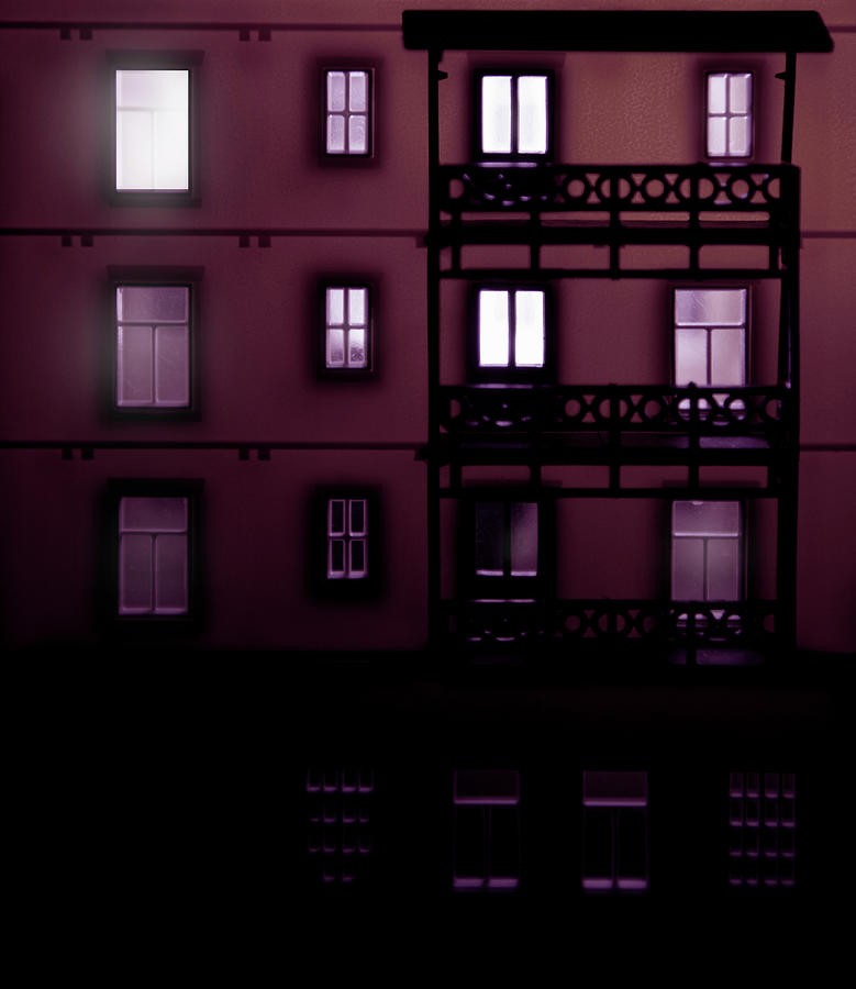 Apartment Building At Night With Lights Photograph by Michael Duva
