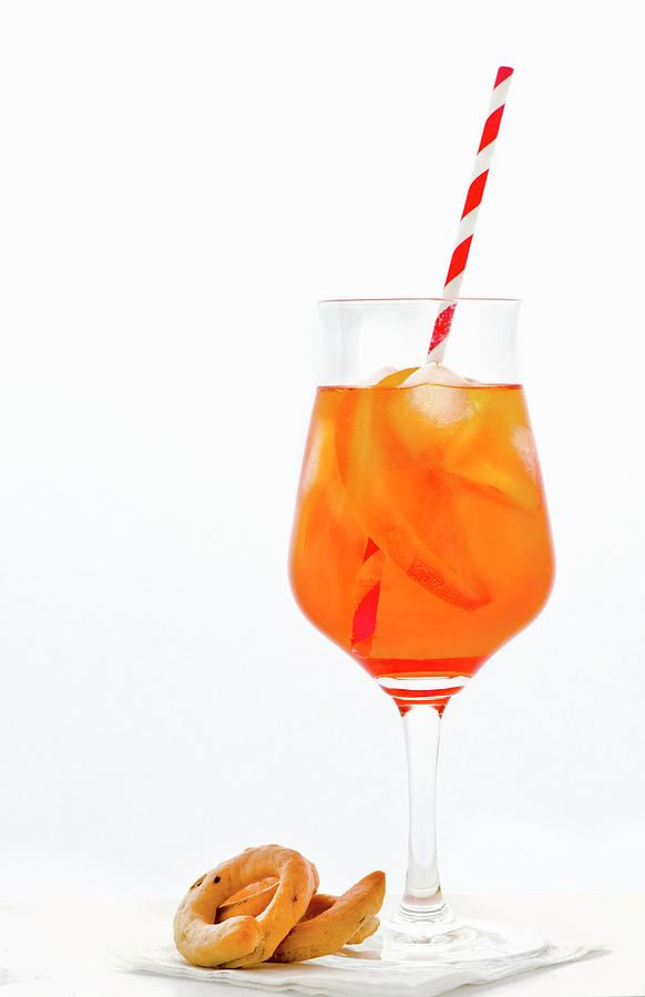 Aperol Spritz In A Glass With Straw Photograph by Jamie Watson