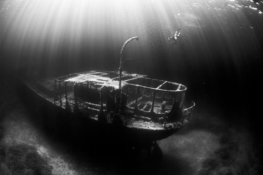 Underwater Photograph - Apnea Of The Wreck Of The Picorella by Eric Volto