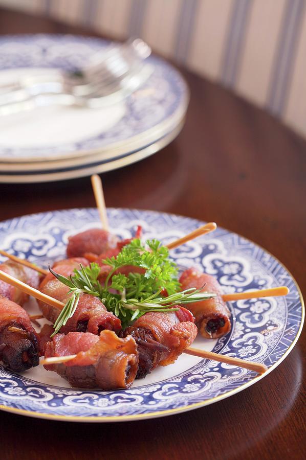 Appetizers Of Bacon Wrapped Dates Photograph by Jennifer Martine